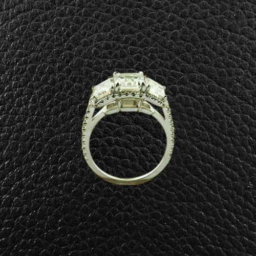 Triple Emerald cut Diamond Ring with Halo